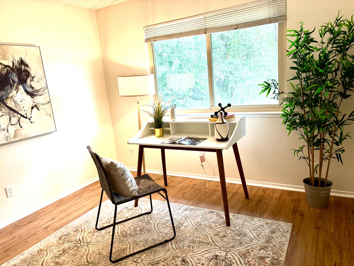 2900 Pole Line Road, Unit 2 Davis, CA 95618 - Photo 21 of 34 a view of a workspace room with furniture and a potted plant