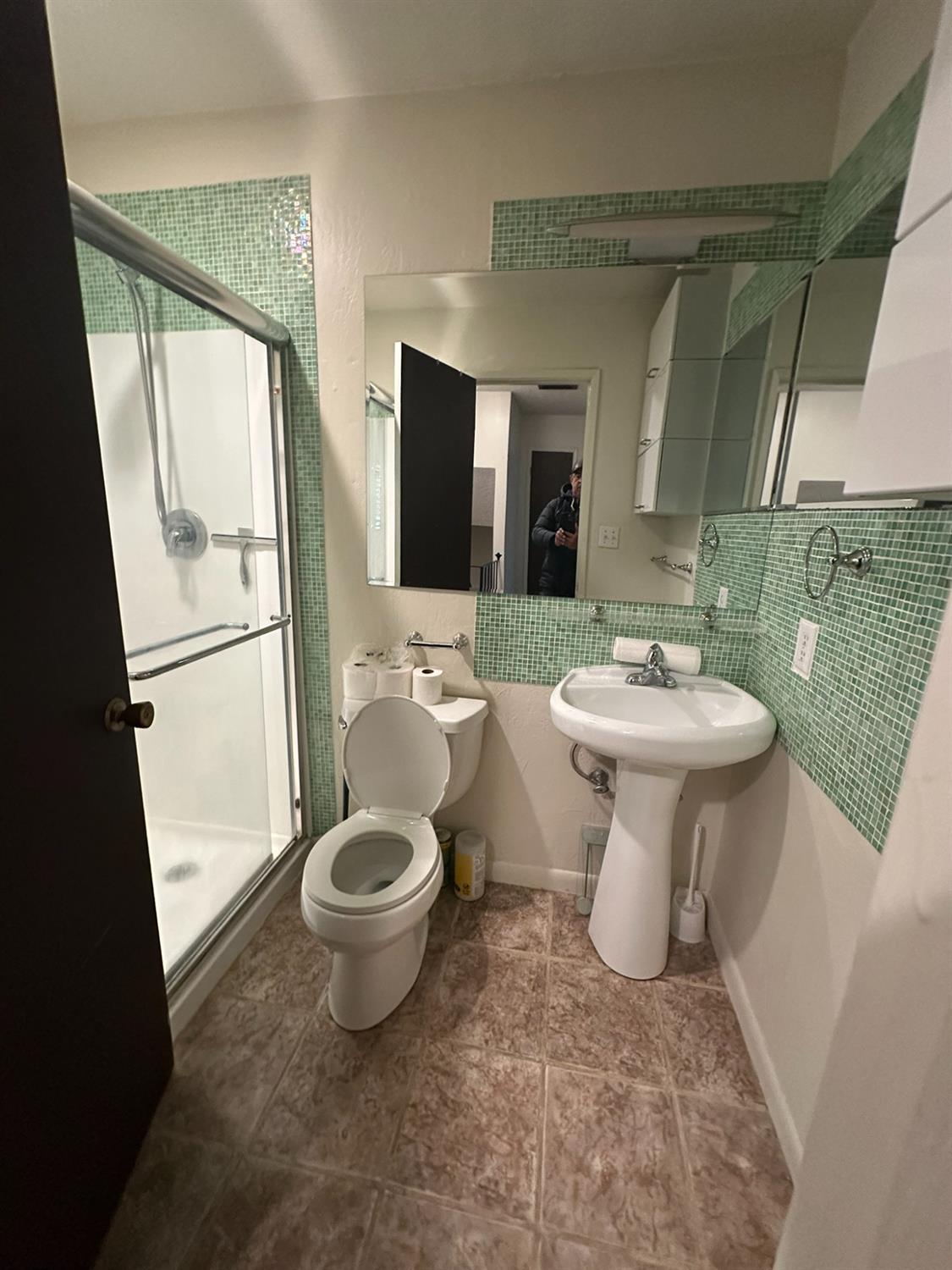 2900 Pole Line Road, Unit 2 Davis, CA 95618 - Photo 22 of 34 a bathroom with a sink toilet and a mirror