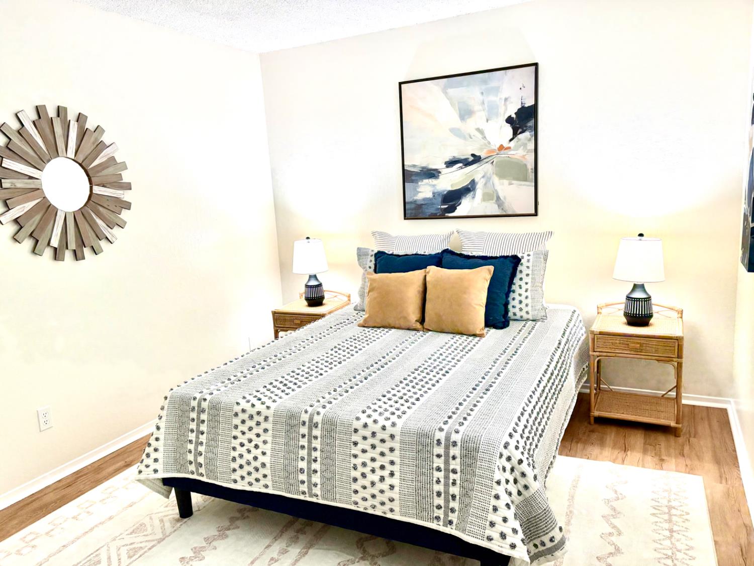 2900 Pole Line Road, Unit 2 Davis, CA 95618 - Photo 25 of 34 a bedroom with a bed and a painting on the wall