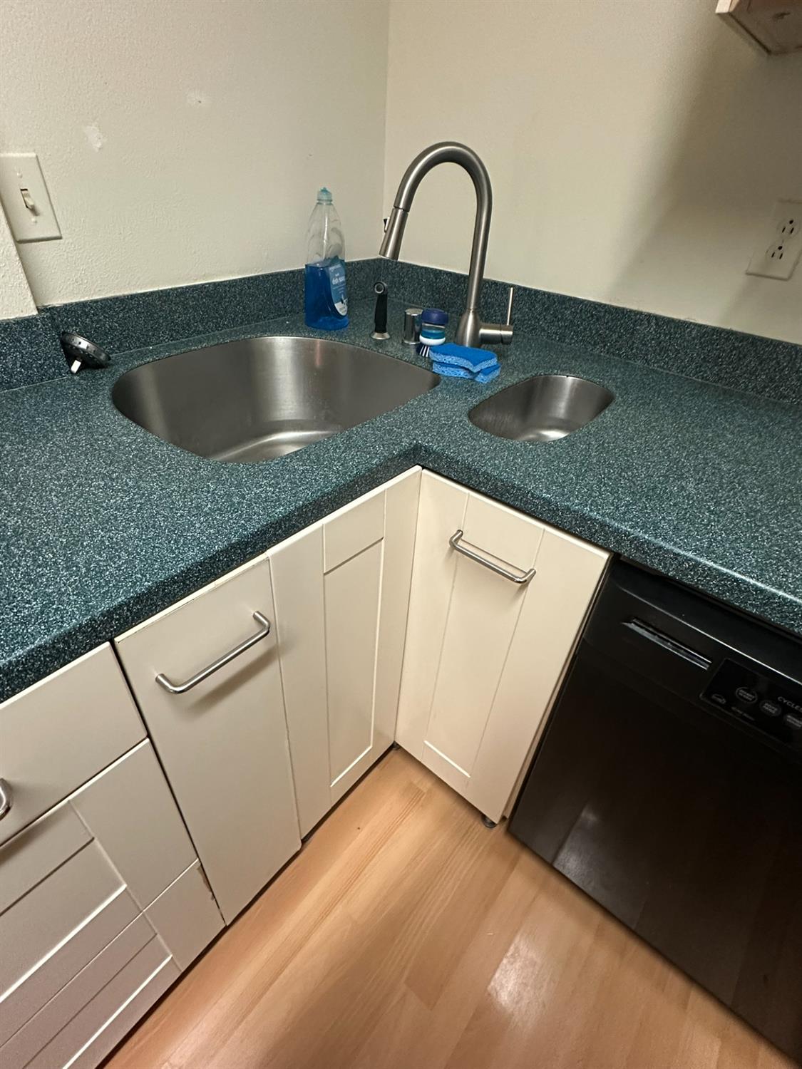 2900 Pole Line Road, Unit 2 Davis, CA 95618 - Photo 9 of 34 a close view of a sink a counter space and appliance in the kitchen