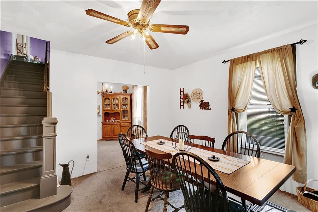 23-25 Locust Street Uniontown, PA 15401 - Photo 12 of 23 a view of a a dining room with furniture window and outside view