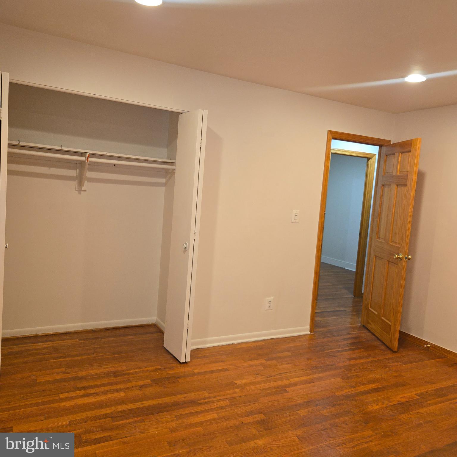 3505 Templar Road Randallstown, MD 21133 - Photo 18 of 40 a view of an empty room with wooden floor and closet