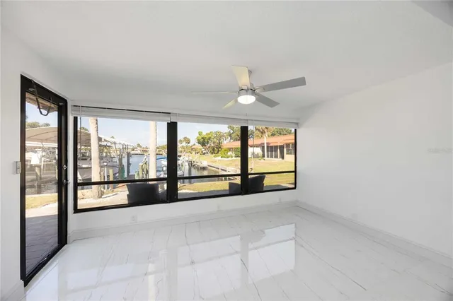 a view of kitchen with table and chairs