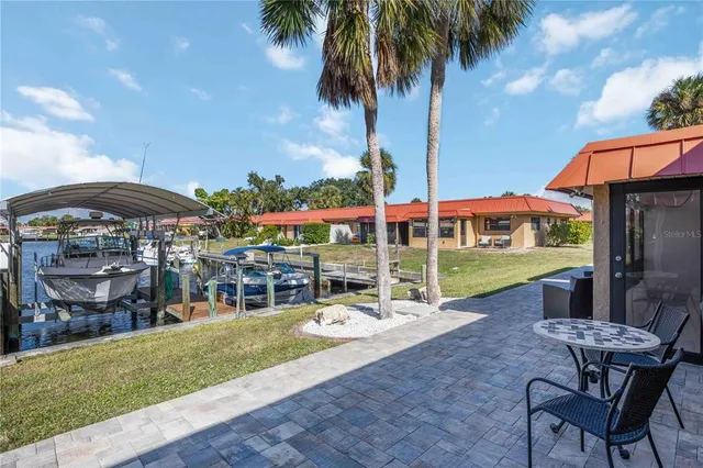a view of balcony with wooden floor
