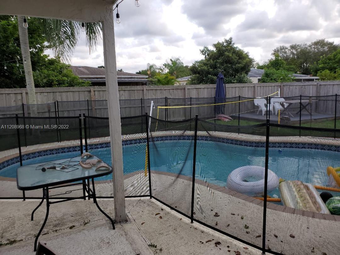 10650 Eland Street Boca Raton, FL 33428 - Photo 13 of 17 a view of a terrace with couches