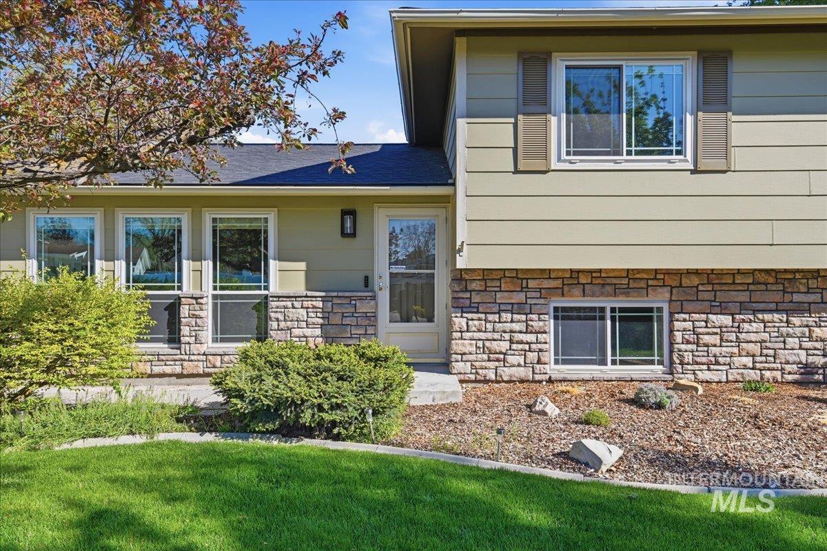 11842 Tioga Street Boise, ID 83709 - Photo 42 of 50 Split-level residence featuring a stone and siding facade