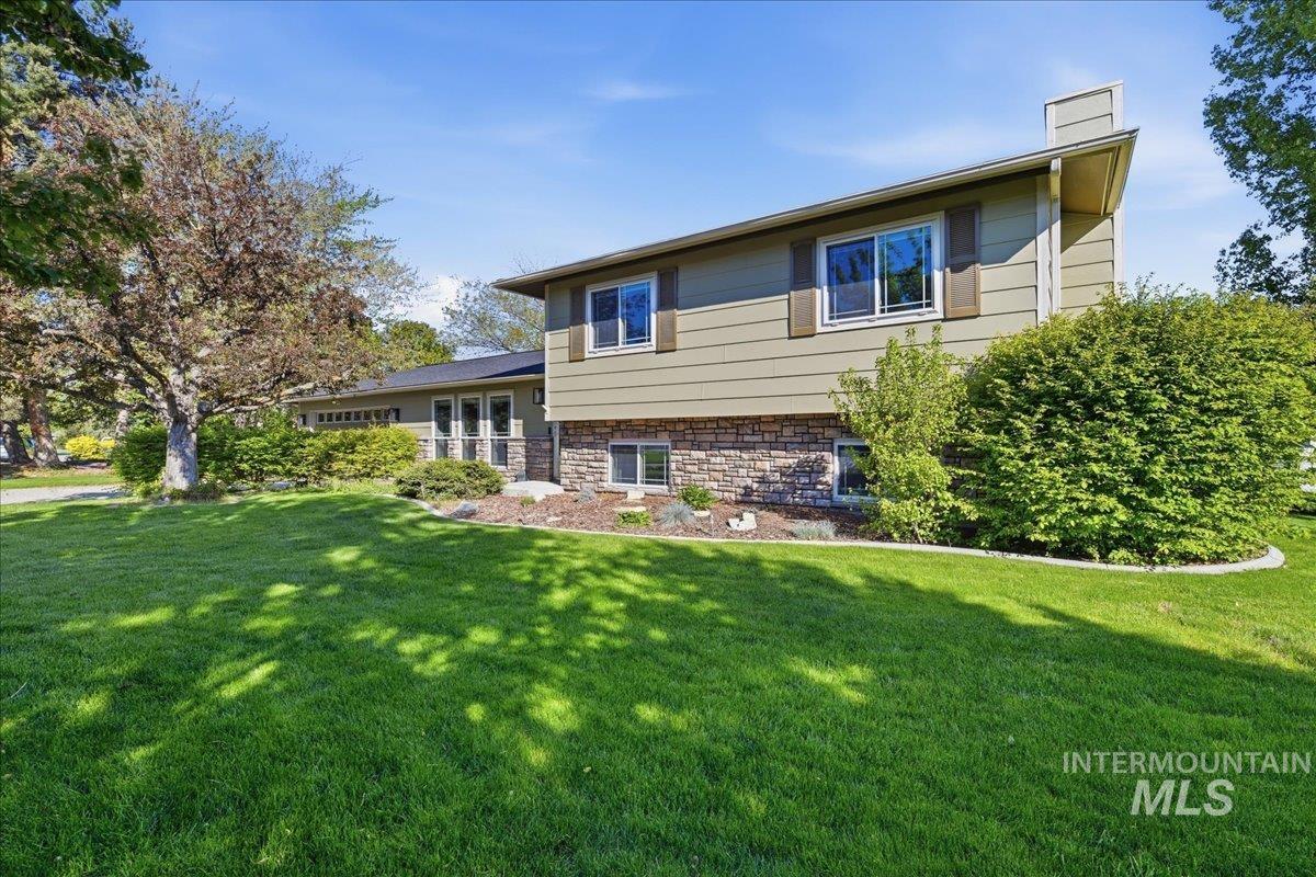 11842 Tioga Street Boise, ID 83709 - Photo 44 of 50 Split-level residence featuring a stone and siding exterior