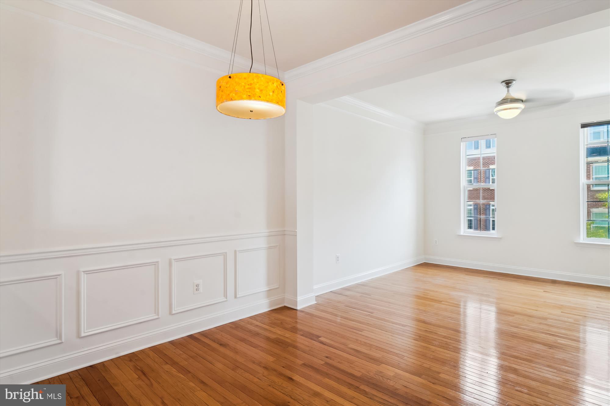 2607 Egret Way Frederick, MD 21701 - Photo 12 of 42 a view of a room with wooden floor and white walls