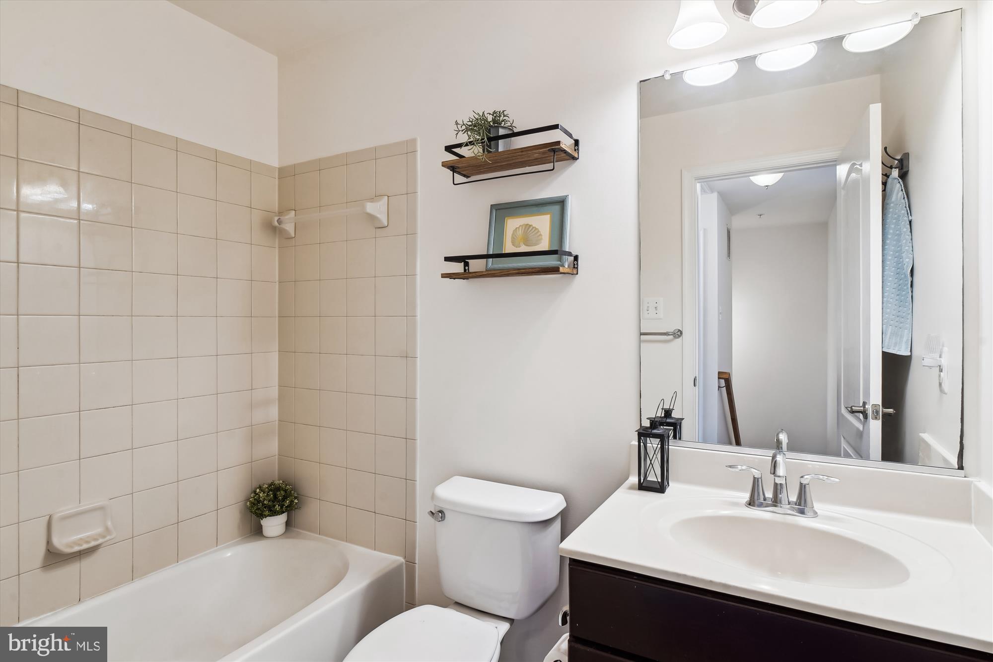 2607 Egret Way Frederick, MD 21701 - Photo 25 of 42 a bathroom with a sink a toilet and shower