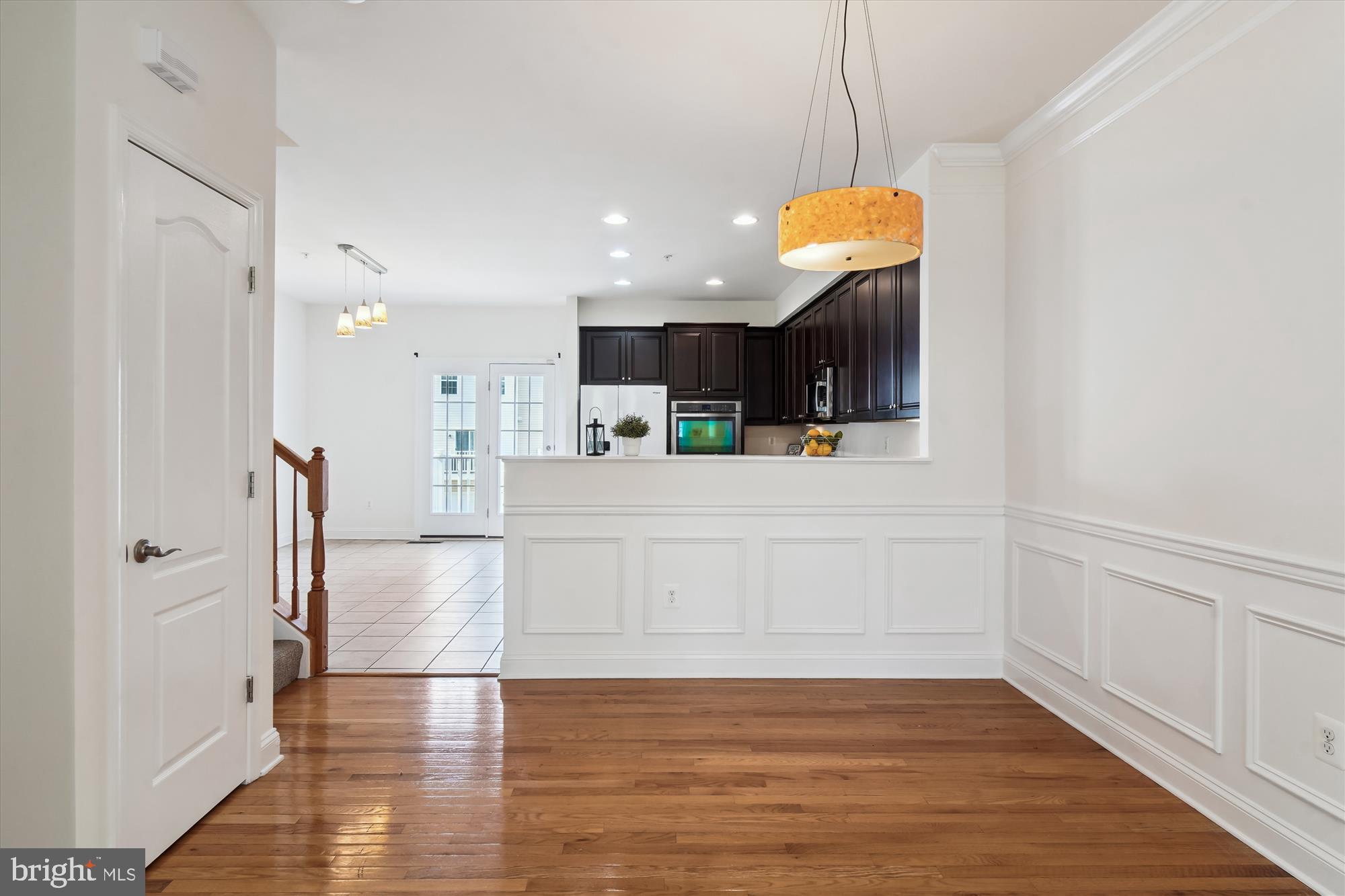 2607 Egret Way Frederick, MD 21701 - Photo 10 of 42 a view of a kitchen with wooden floor and a window