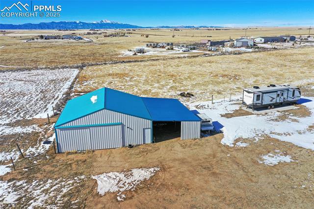 20480 Enoch Road Colorado Springs, CO 80928 - Photo 5 of 45 Birds eye view of property featuring a mountain view