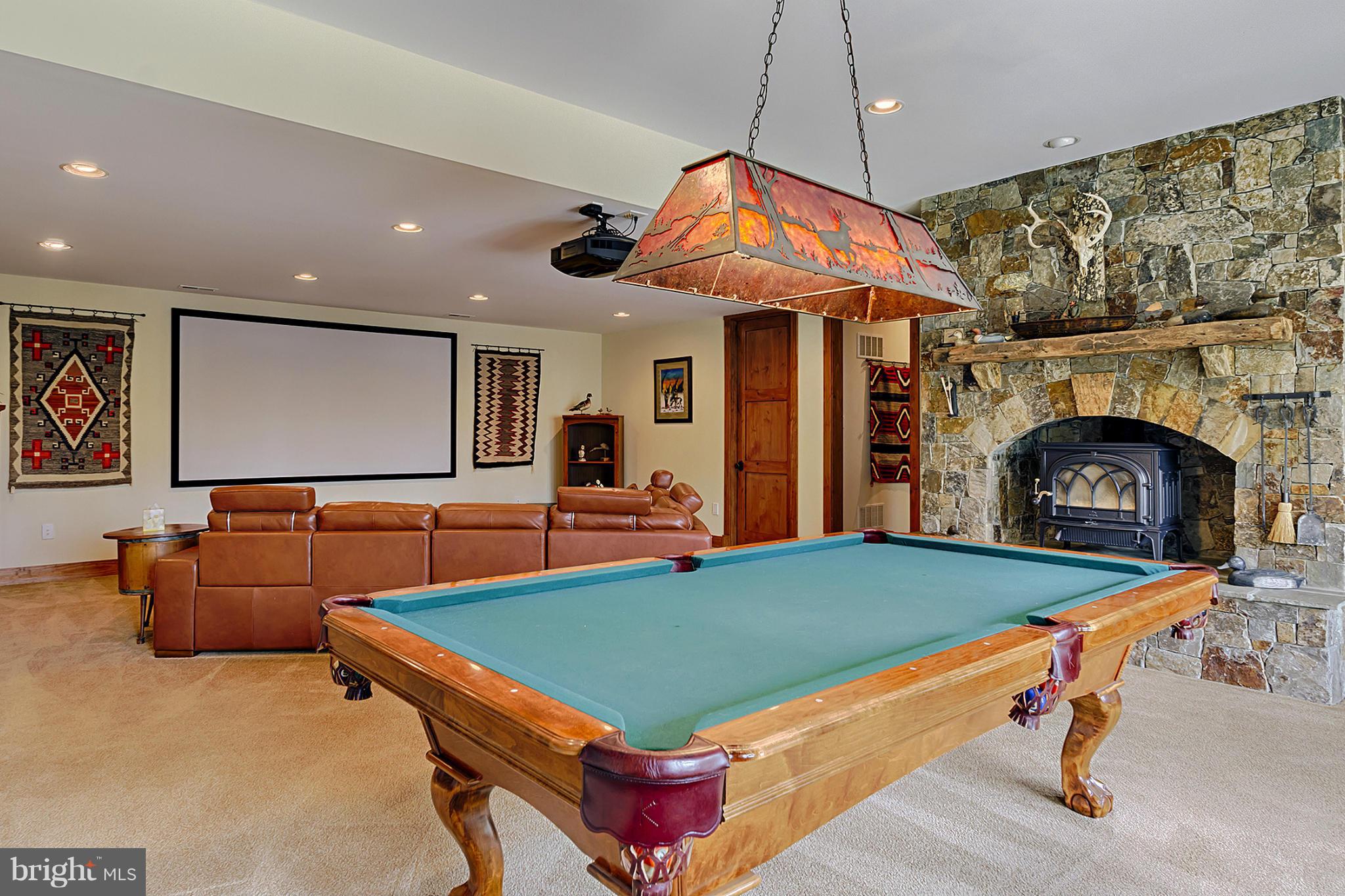 13001 Wainwright Road Highland, MD 20777 - Photo 20 of 30 a room with projector and a table