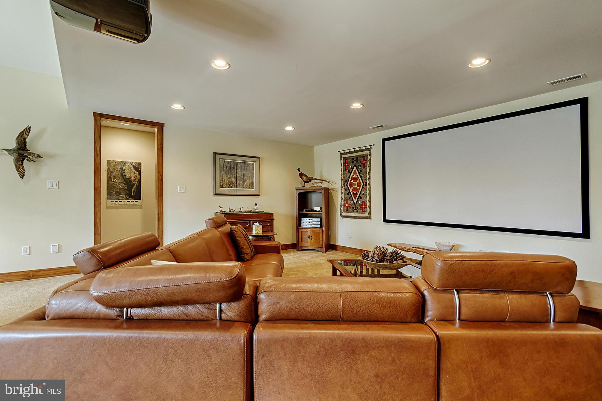 13001 Wainwright Road Highland, MD 20777 - Photo 21 of 30 a living room with furniture and a flat screen tv