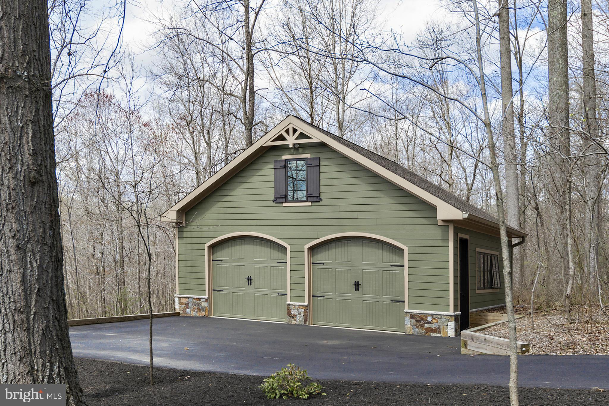 13001 Wainwright Road Highland, MD 20777 - Photo 30 of 30 a front view of a house with a garage