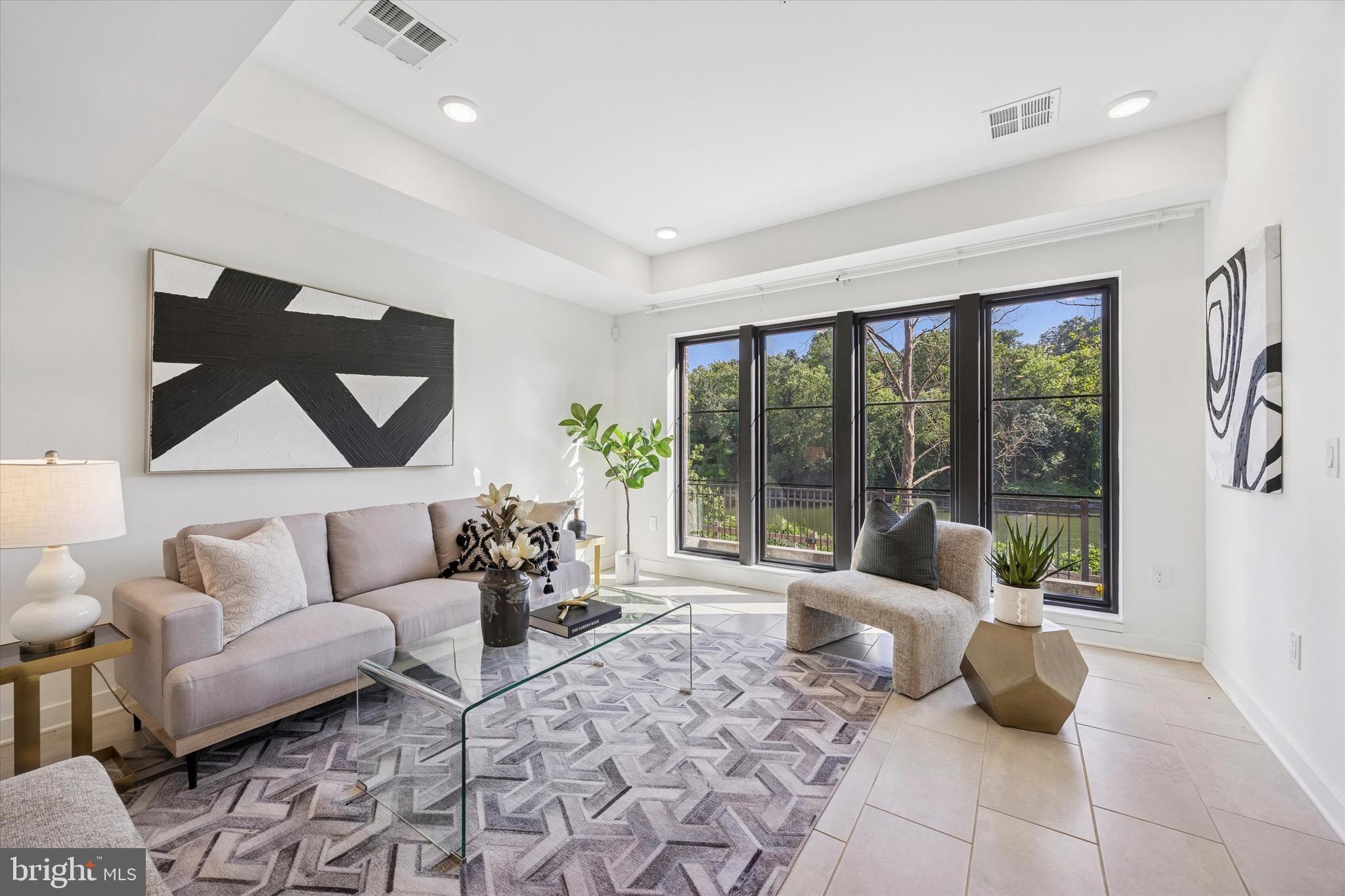 4548 Riverside Way Philadelphia, PA 19127 - Photo 2 of 5 a living room with furniture and a large window