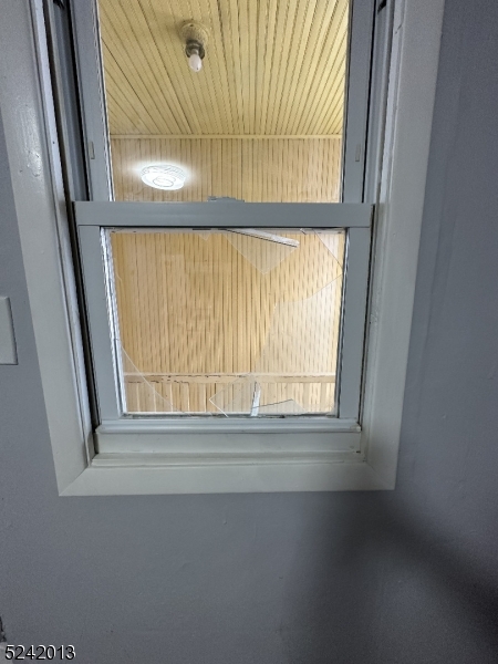 1032 Olive Street, Unit 3 Elizabeth, NJ 07201 - Photo 6 of 9 a view of an empty room with a window