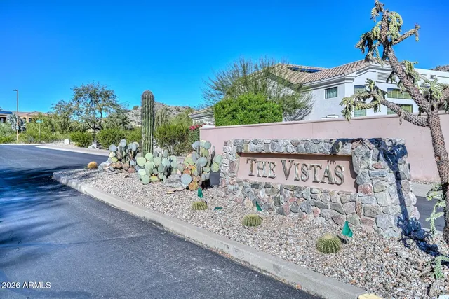 a street sign on a pole on a street