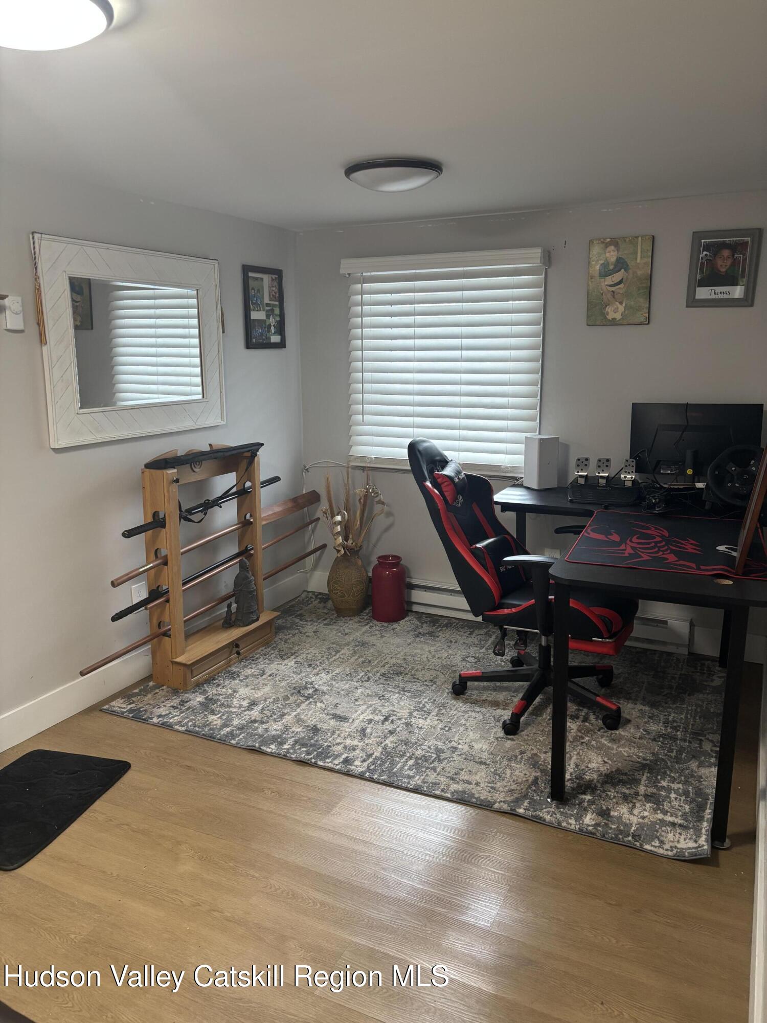 83 Marple Rd Extension Poughkeepsie, NY 12603 - Photo 13 of 23 a living room with furniture and wooden floor