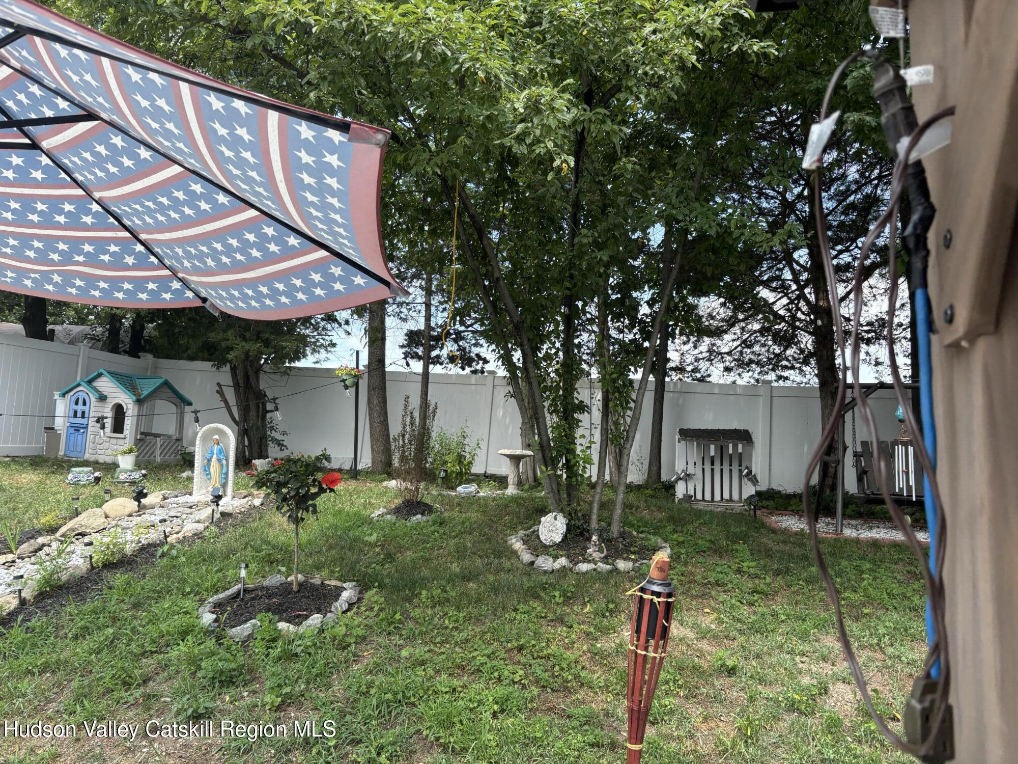 83 Marple Rd Extension Poughkeepsie, NY 12603 - Photo 20 of 23 a front view of a house with garden