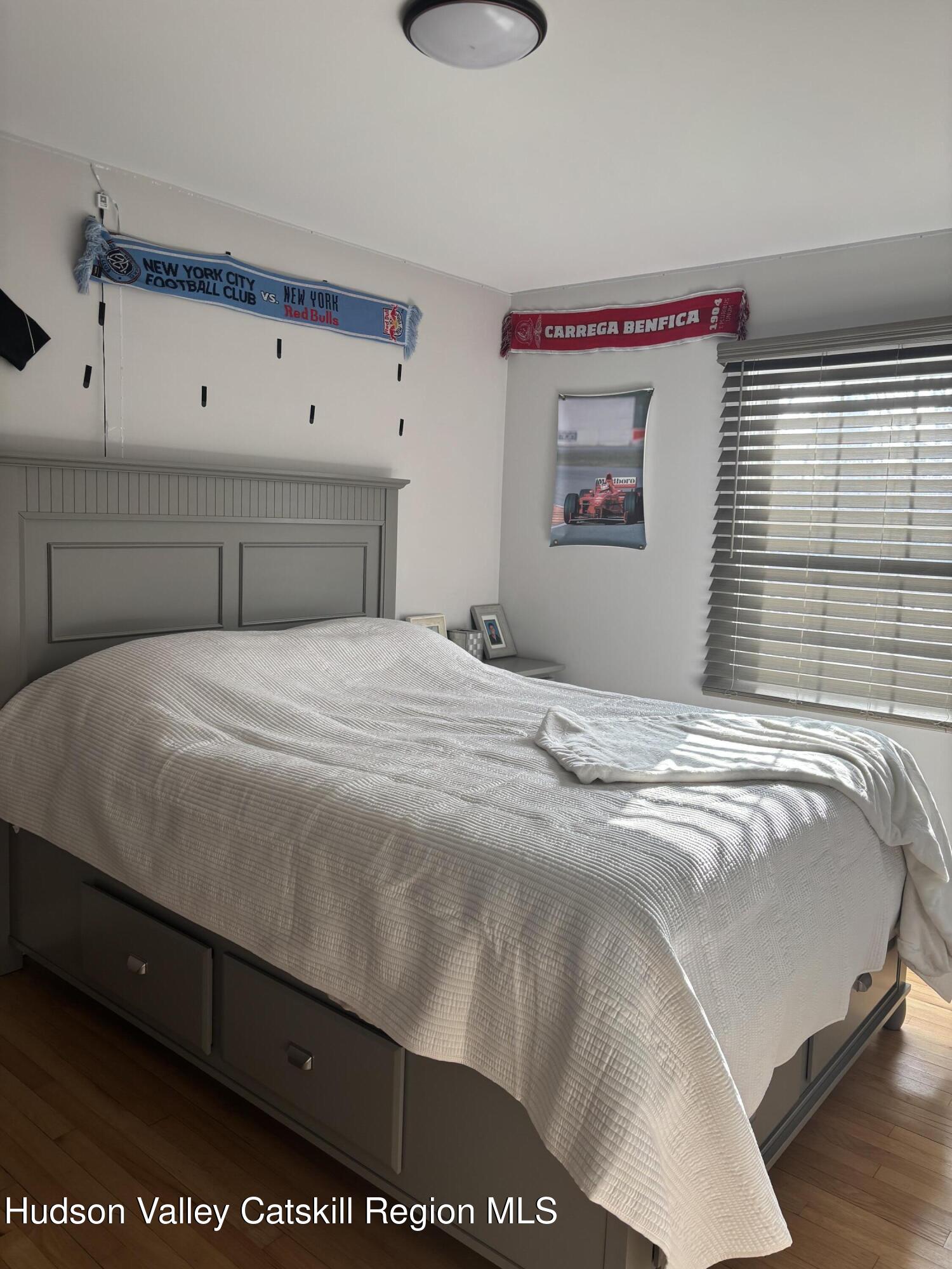 83 Marple Rd Extension Poughkeepsie, NY 12603 - Photo 9 of 23 a bedroom with a bed and a window