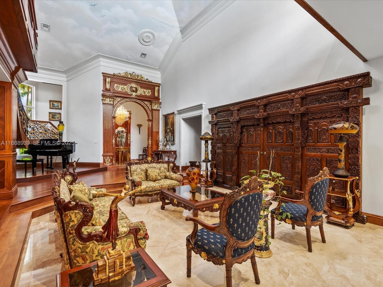 2941 Paddock Lane Weston, FL 33331 - Photo 12 of 90 a view of a dining room with furniture and chandelier