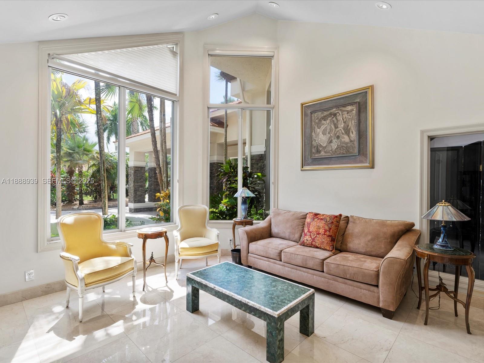 2941 Paddock Lane Weston, FL 33331 - Photo 18 of 90 a living room with furniture and a large window