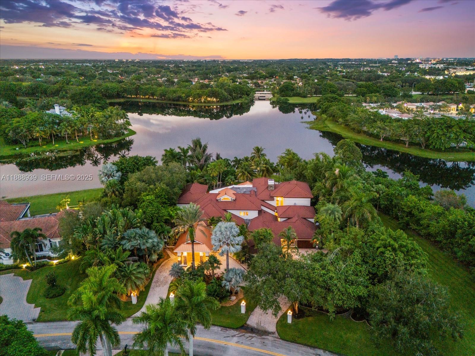2941 Paddock Lane Weston, FL 33331 - Photo 2 of 90 an aerial view of house with yard swimming pool and outdoor seating