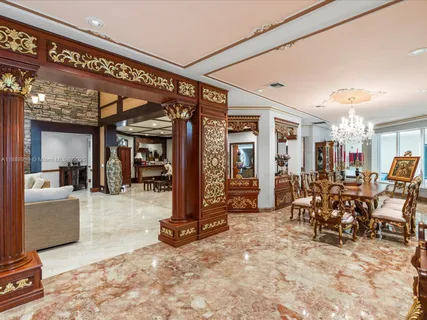 a spacious bathroom with a sink a large mirror and a bathtub