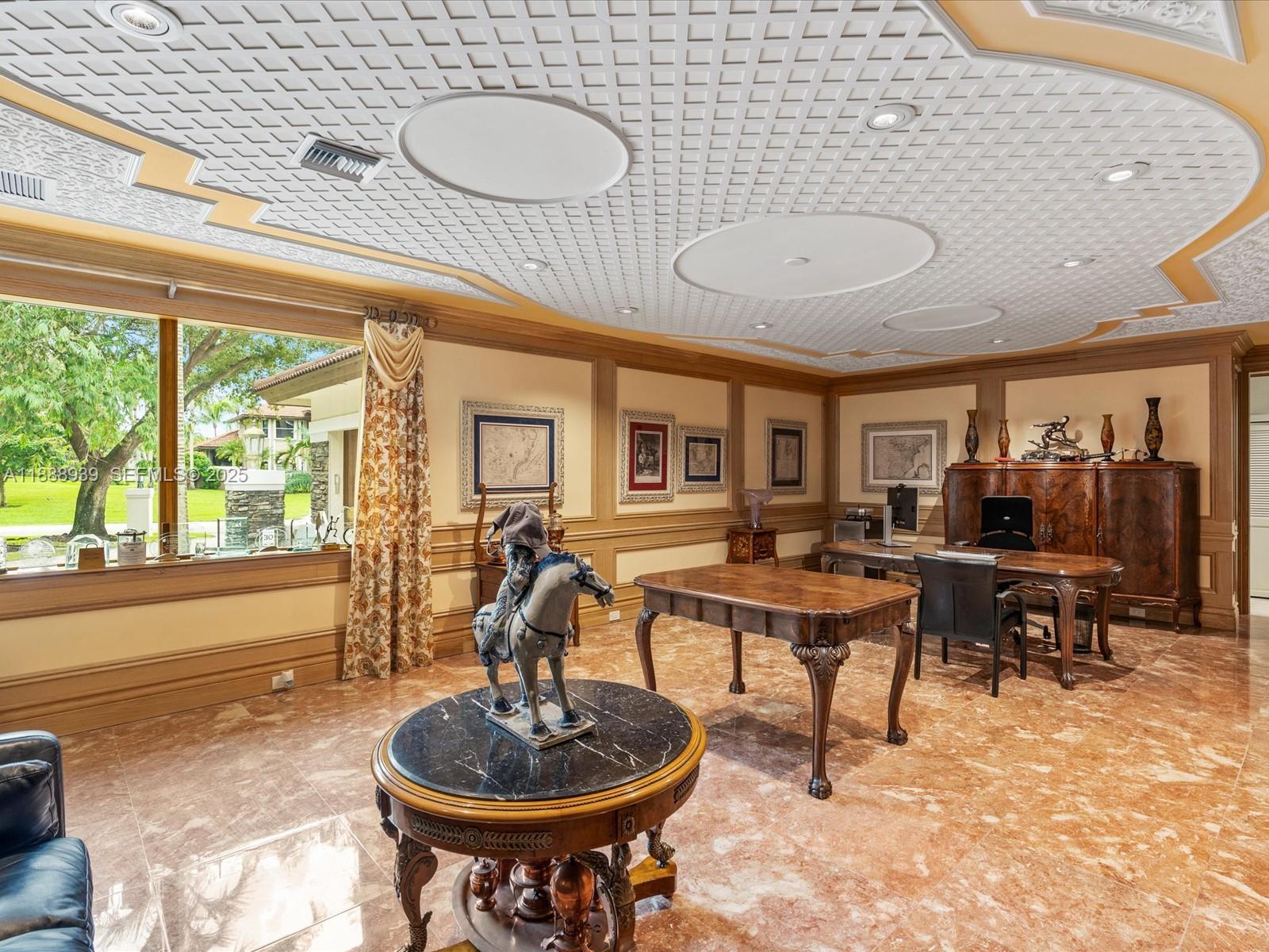 2941 Paddock Lane Weston, FL 33331 - Photo 25 of 90 a living room with furniture a piano and a large window