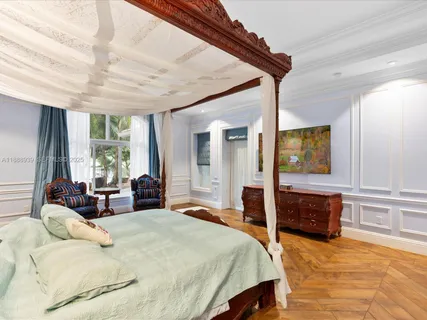 a bedroom with a bed and a closet