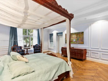 a bedroom with a bed and a closet