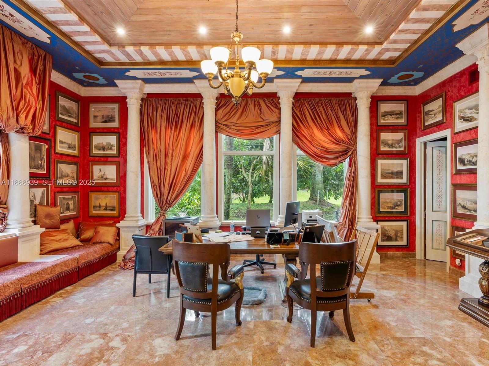 2941 Paddock Lane Weston, FL 33331 - Photo 48 of 90 a view of a dining room with furniture a chandelier and wooden floor