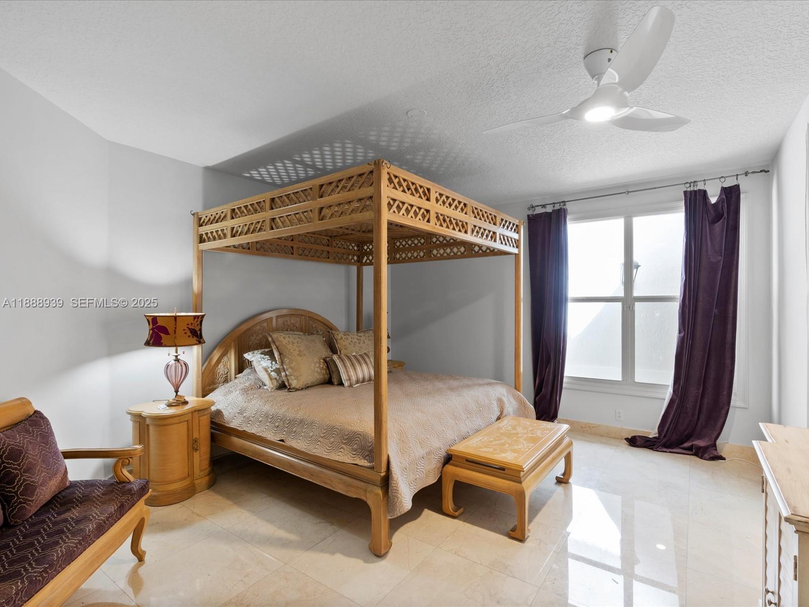 2941 Paddock Lane Weston, FL 33331 - Photo 50 of 90 a bedroom with furniture and a window