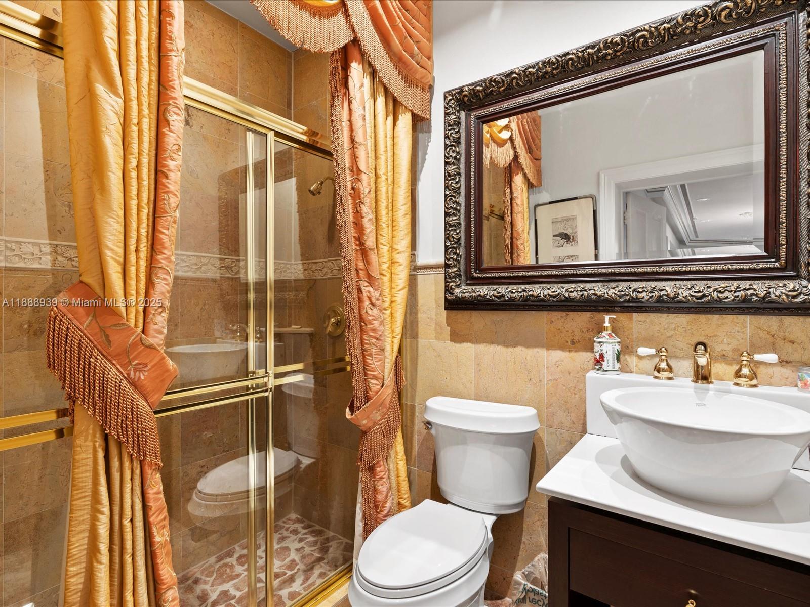 2941 Paddock Lane Weston, FL 33331 - Photo 51 of 90 a bathroom with a sink a toilet and shower