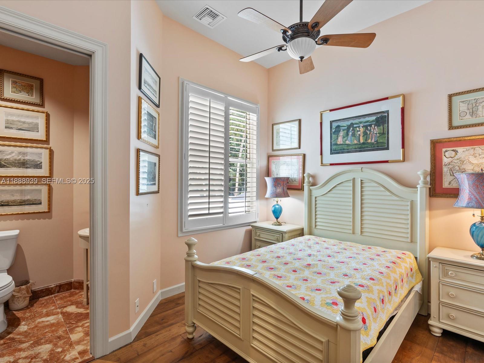 2941 Paddock Lane Weston, FL 33331 - Photo 70 of 90 a bedroom with a bed dresser and a window