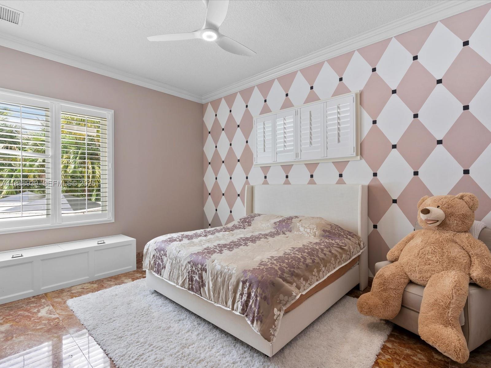 2941 Paddock Lane Weston, FL 33331 - Photo 73 of 90 a bedroom with a bed and a window