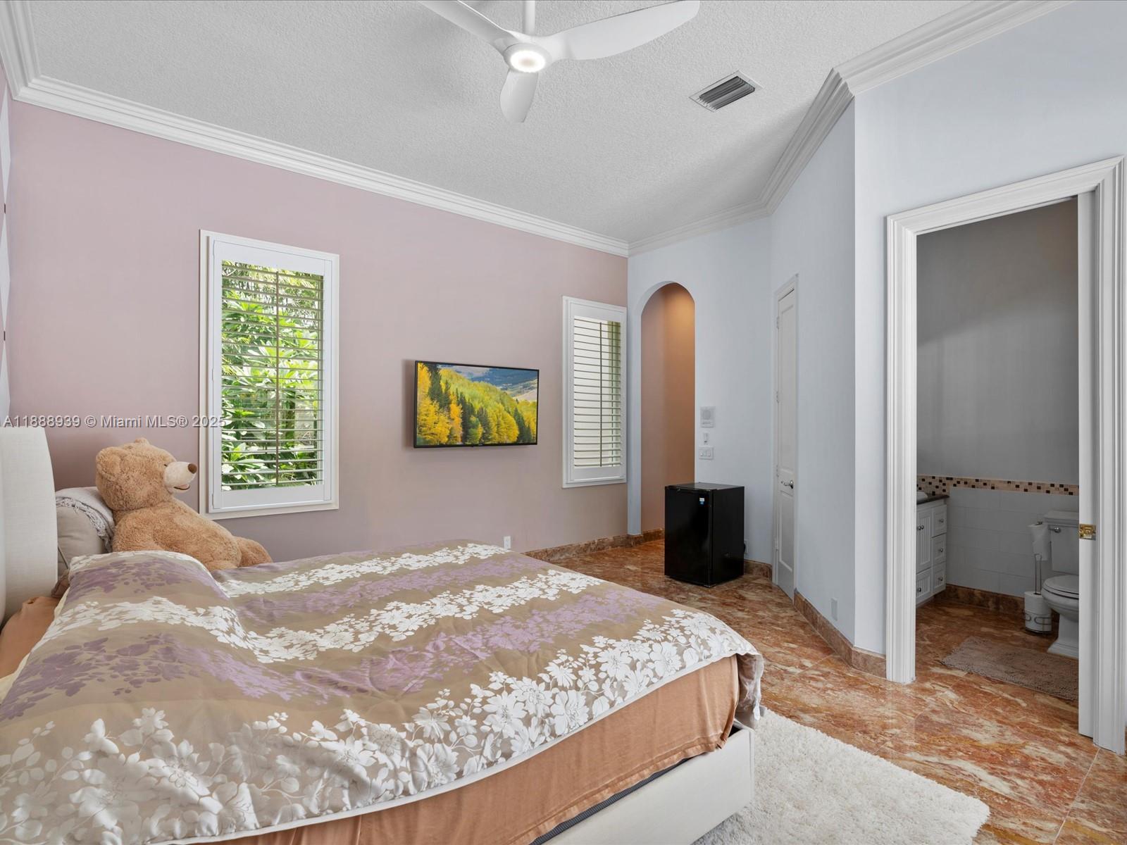 2941 Paddock Lane Weston, FL 33331 - Photo 74 of 90 a bedroom with a bed and a closet