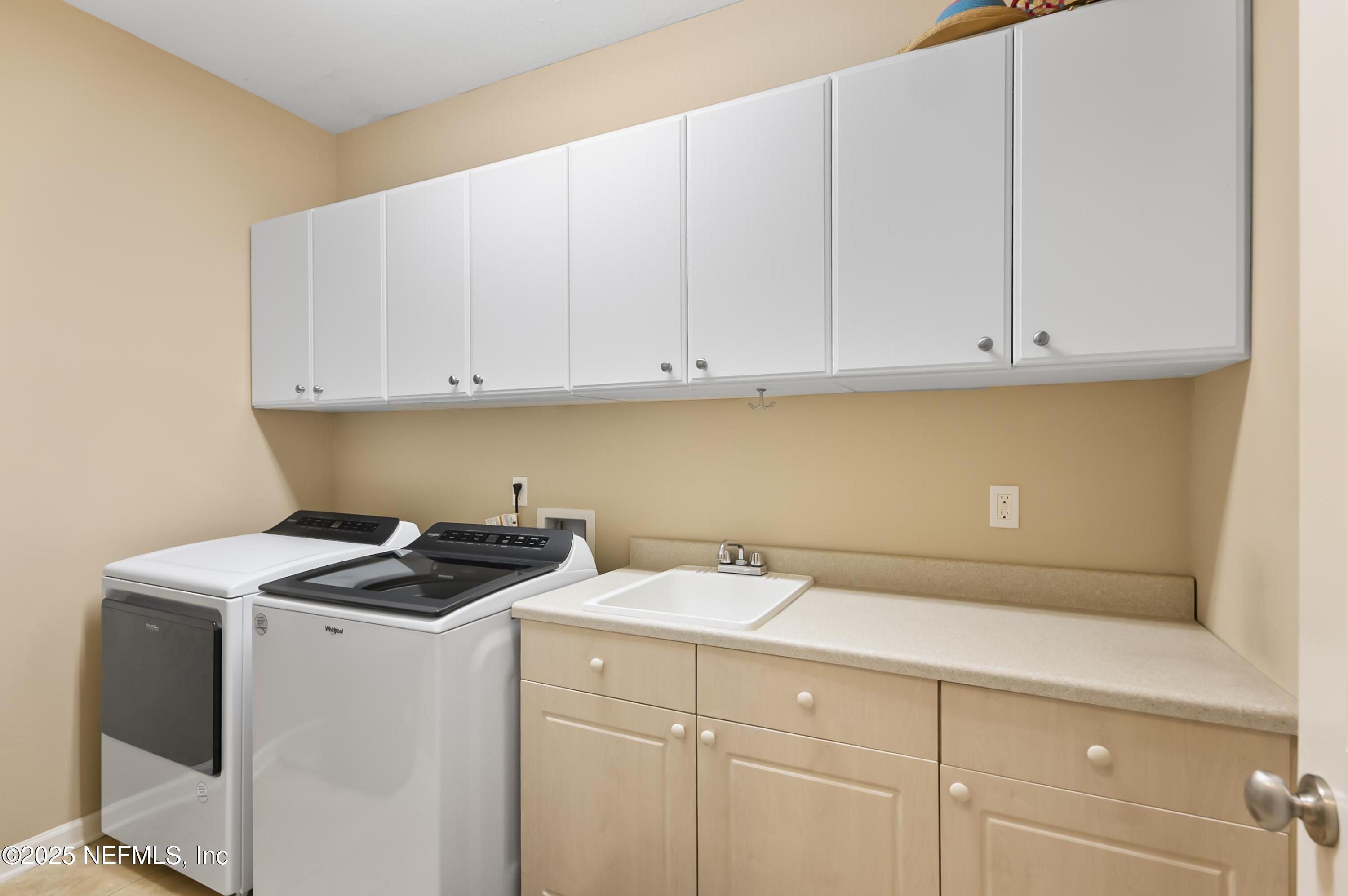 649 Treehouse Circle St. Augustine, FL 32095 - Photo 90 of 207 Laundry Storage & Sink