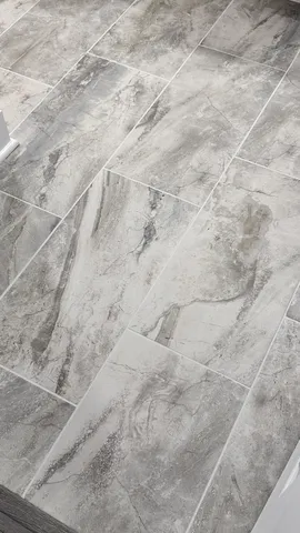 a bathroom with a toilet a sink and bathtub