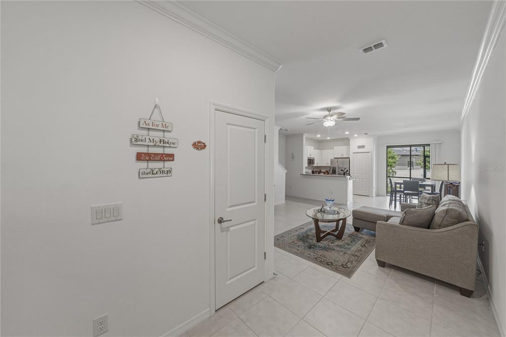 30688 Veridian Way Wesley Chapel, FL 33543 - Photo 2 of 55 a living room with furniture and a table