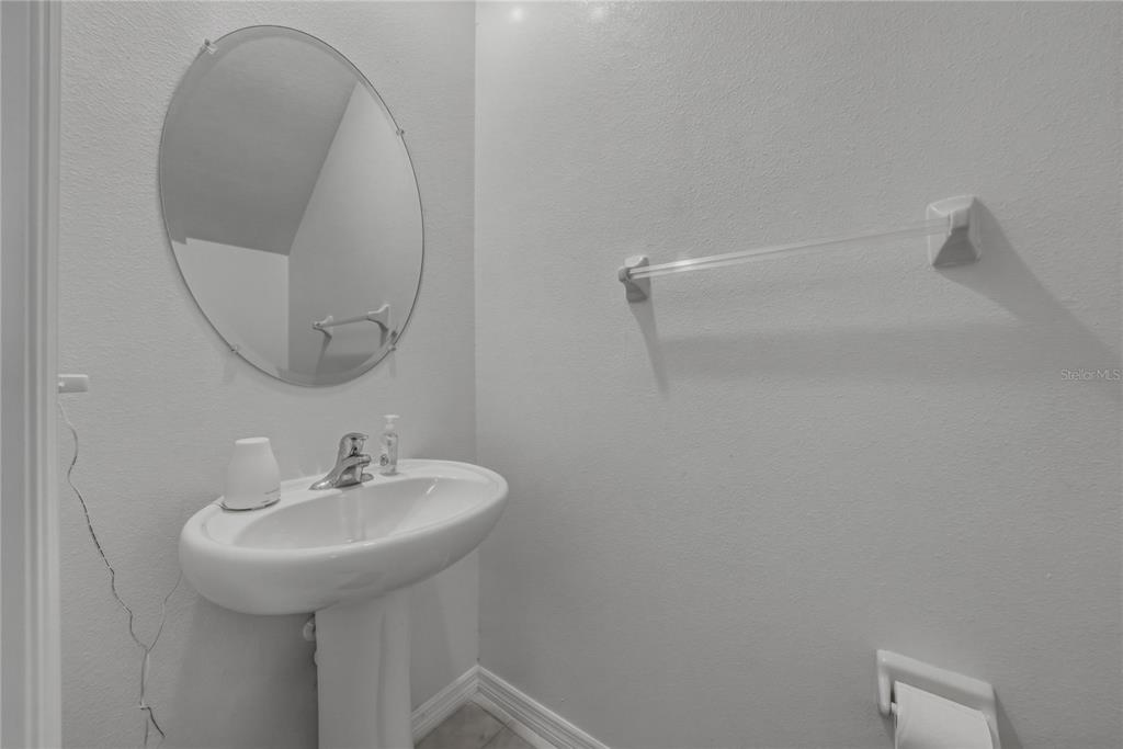 30688 Veridian Way Wesley Chapel, FL 33543 - Photo 41 of 55 a bathroom with a sink and a mirror