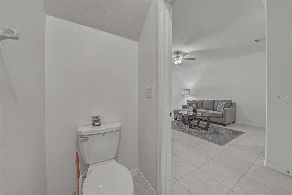 30688 Veridian Way Wesley Chapel, FL 33543 - Photo 42 of 55 a bathroom with a toilet