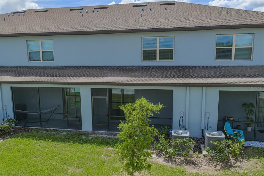 30688 Veridian Way Wesley Chapel, FL 33543 - Photo 47 of 55 a front view of a house with porch