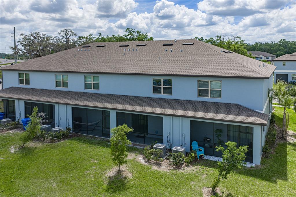 30688 Veridian Way Wesley Chapel, FL 33543 - Photo 49 of 55 front view of a house with a yard