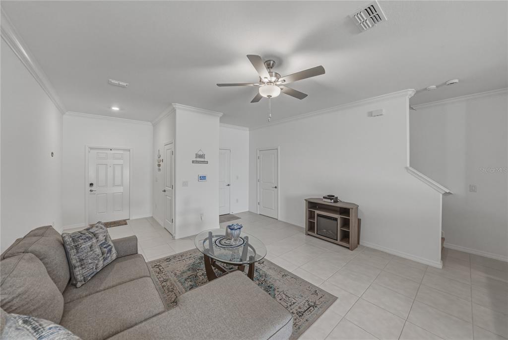 30688 Veridian Way Wesley Chapel, FL 33543 - Photo 6 of 55 a living room with furniture