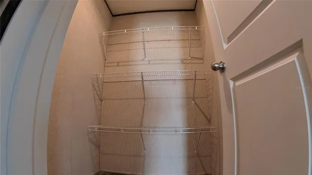 a bathroom with a glass door shower