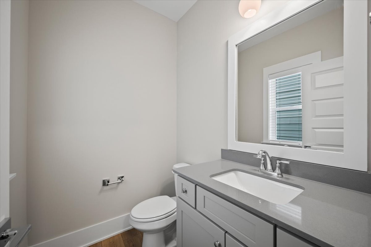 3043 A Hillside Road Nashville, TN 37207 - Photo 11 of 31 a bathroom with a granite countertop sink toilet and a mirror