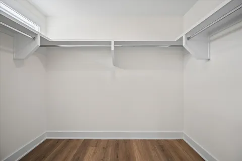 a view of an empty walk in closet