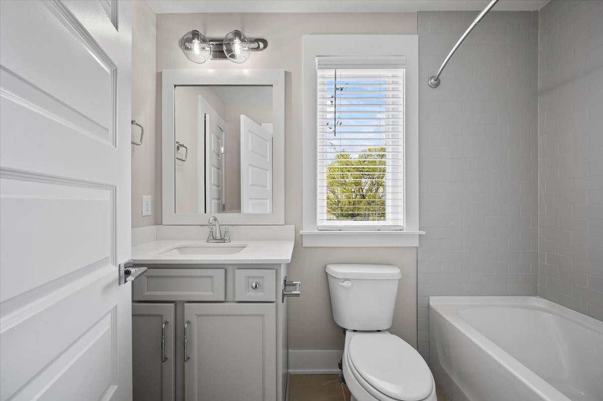 3043 A Hillside Road Nashville, TN 37207 - Photo 23 of 31 a bathroom with a toilet sink and mirror