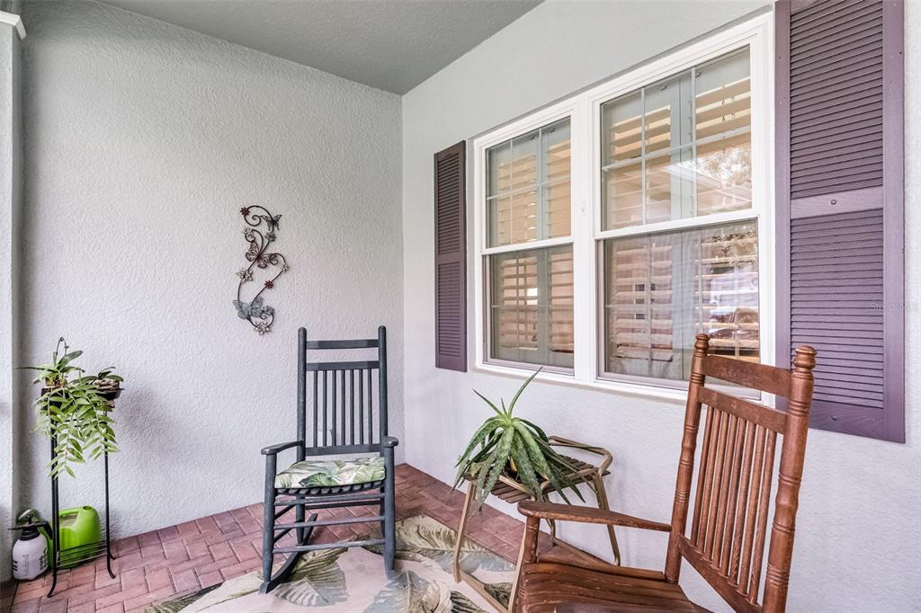 1124 Hidden Bluff Clermont, FL 34711 - Photo 20 of 25 a view of a dining room with furniture window and wooden floor